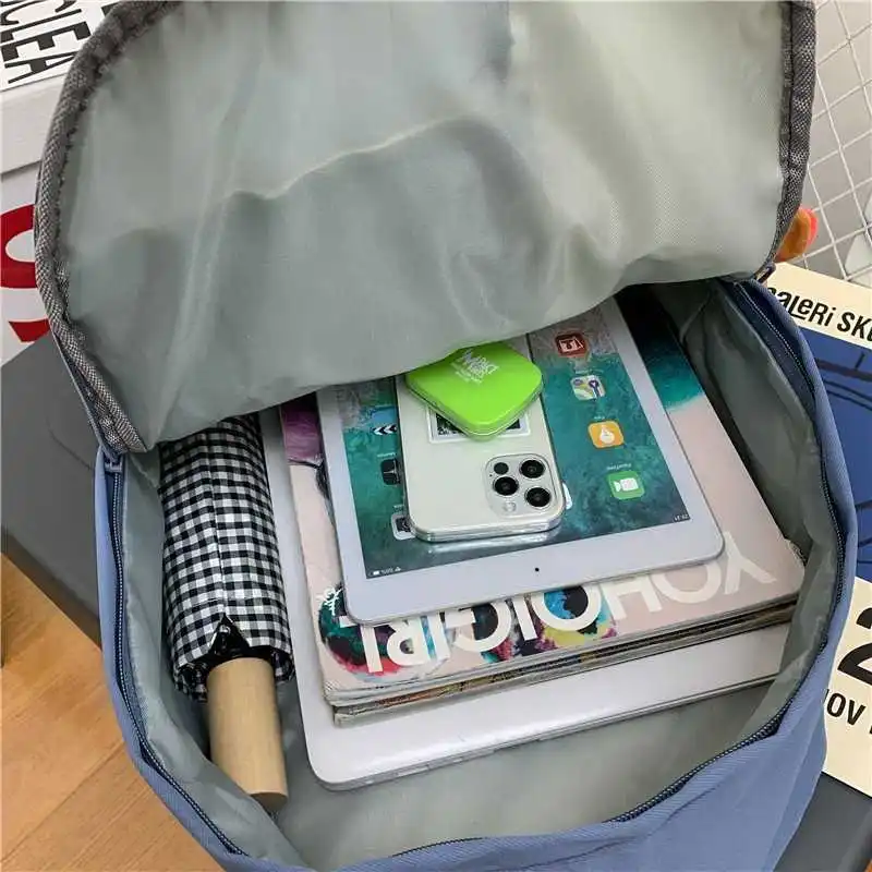 

New solid color dwaterproof water nylon female backpack college travel travel bag capacity portable