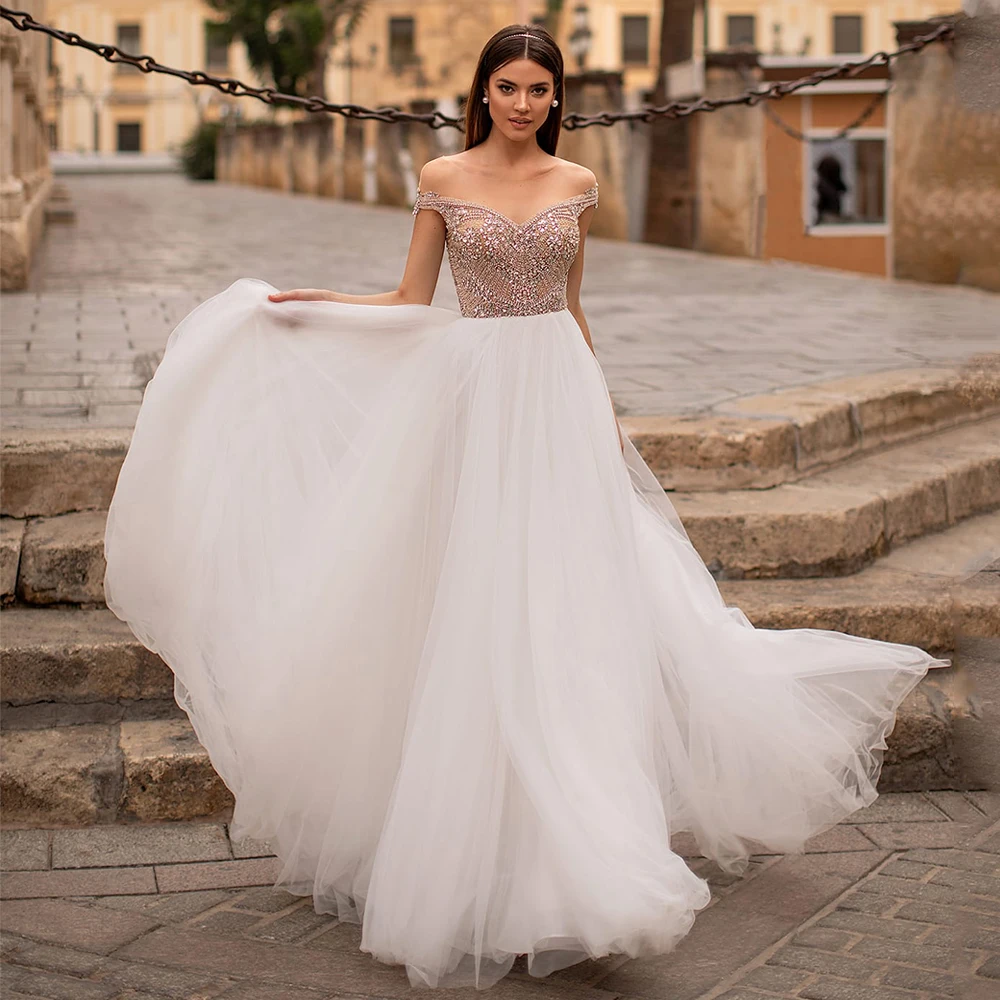 

Sparkling Crystals Wedding Dress Sexy Sheer Scoop Neck Beading Tulle A Line Sweep Train Bridal Gown Robe De Mariee