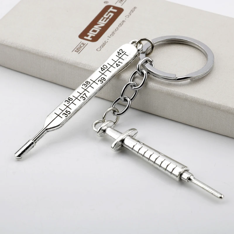 

Metal Doctor Nurse syringe thermometer Keychains The Walking Dead Thermometer Syringe Bags Clothes Car Keyrings For Friends Gift