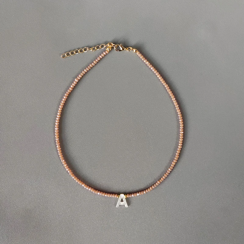 Ожерелье ручной работы с хрустальными бусинами ракушками и буквами различные