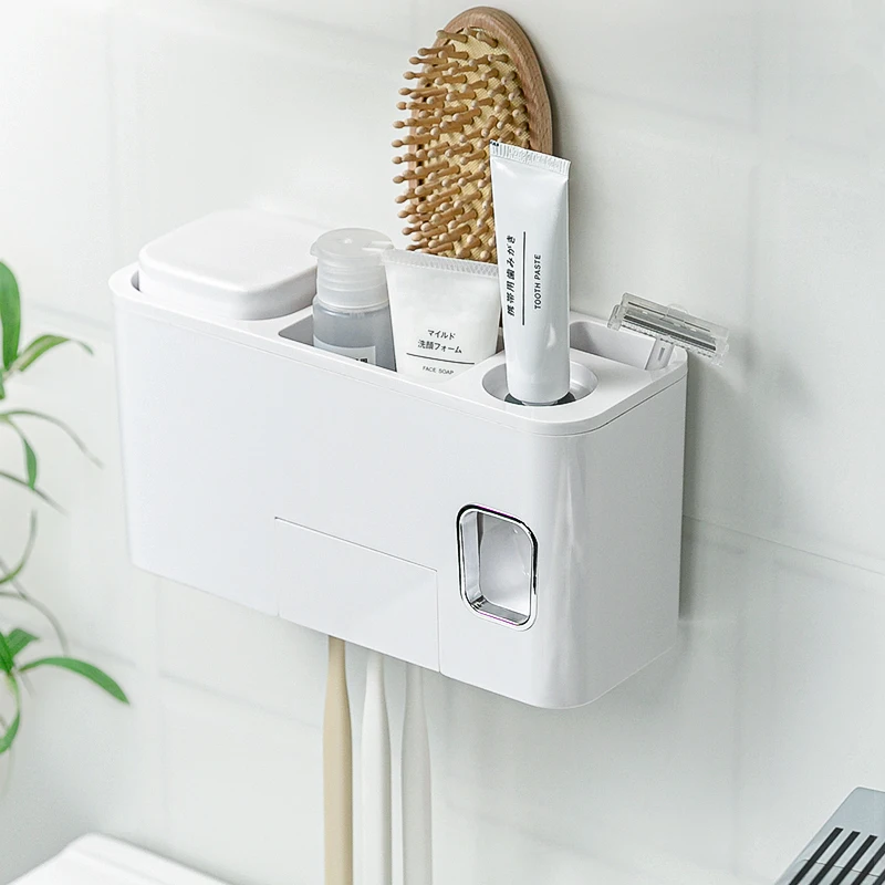 

Wall-mounted magnetic double cup toothbrush holder Three-dimensional rack with squeezing toothpaste