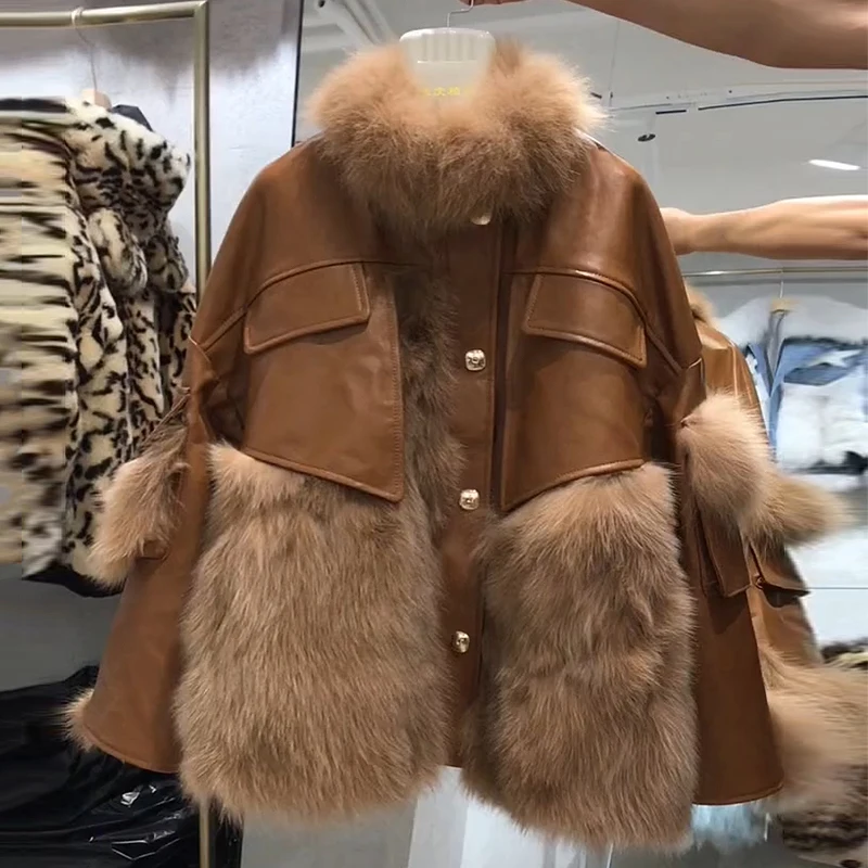 Women's leather clothing fashion imitation fox fur stitching fur jacket 2021 winter new PU leather leather jacket women