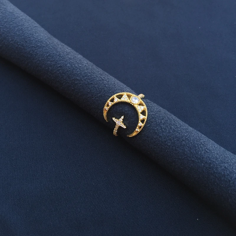 

cheny s925 sterling silver February new golden yellow star moon hollow rings female fashion pretty light luxury star moon rings