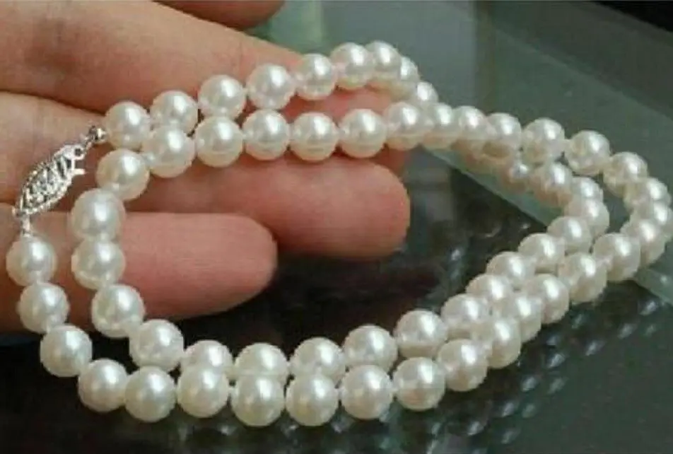 

Stunning natural 6-7mm WHITE Freshwater Cultured PEARLS NECKLACE 18