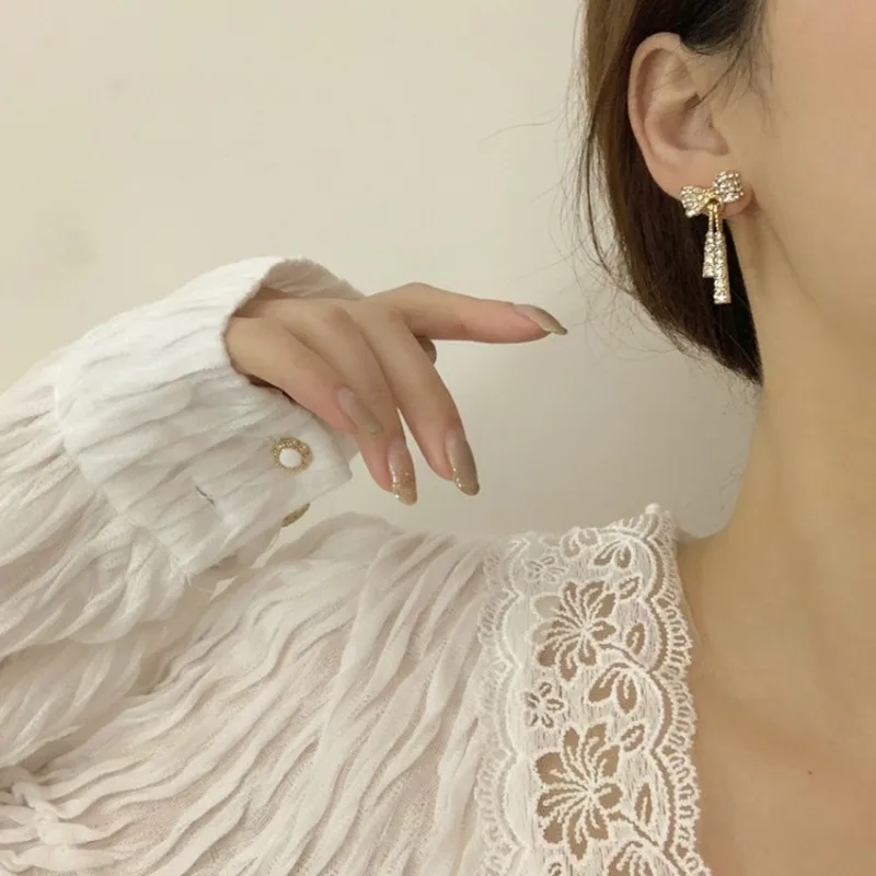 

MIREINA Metal Bowtie Earrings With Clear Rhinestones Shaky Pendant Pretty Drop Earrings Jewelry For Woman