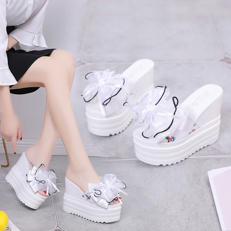 

Cool Slippers Women's Summer 2020 Flower Fish Mouth High Heel Slip Interior Raised Muffin Thick Sole White Slope Heel Slippers