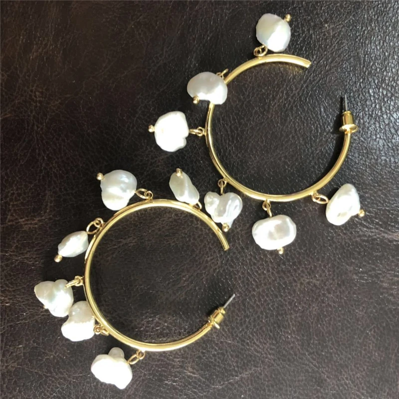 

European and American niche design C-shaped natural Baroque Pearl Girls retro advanced sense exaggerated atmospheric