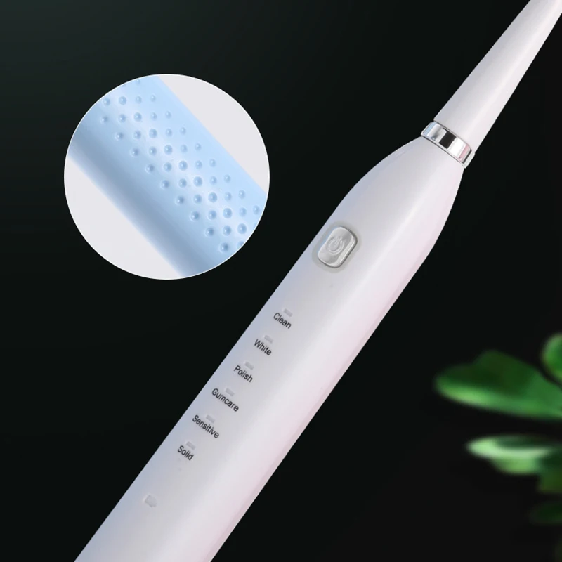 

Electric Toothbrush USB 4 Replacement Heads 6 Cleaning Modes
