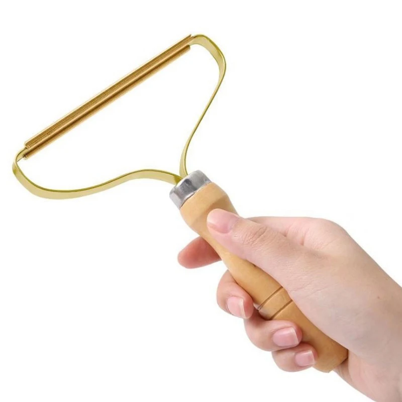 

Переносной инструмент для удаления катышков