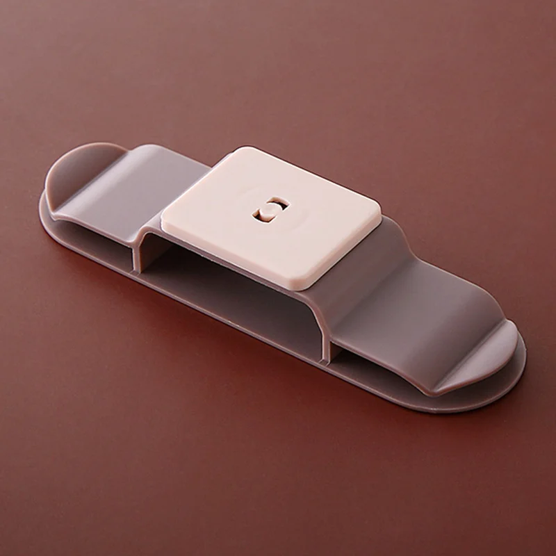 

The New Rotary Socket Holder Punch-Free Wall Socket Power Strip Storage Plug Hook Cord Winder H88F