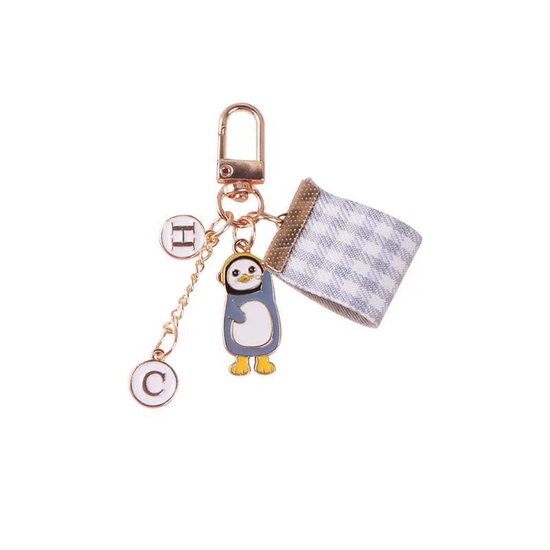 

Creative Alloy Drip Penguin Key Ring Latticed Cloth Chain Pendant Key Chain Sweethearts Student Bags Key Chains Wholesale