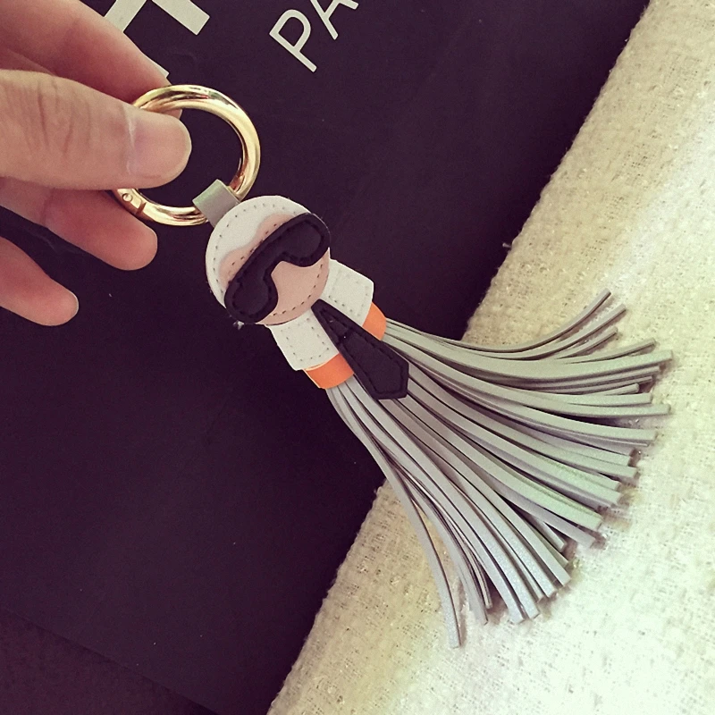 

Cute key chain for Women Kar trinket Bag Bugs Car key ring Tassels Bag Charm Holder Ornaments Leather keychain K008-black