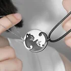 Черно-белое колье с подвеской в виде кота