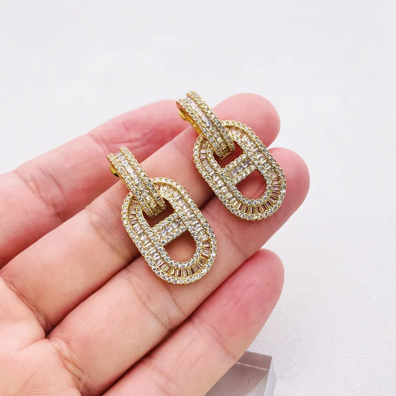 

Personality Gold Silver Color Hollow Oval Round Zircon Drop Dangle Earring for Women Girl Brass Geometric Small Pendant Earrings
