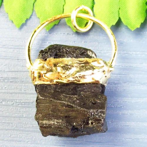 

Golden Wrapped Natural Black Tourmaline Freeform Pendant Bead 45x27x18mm SK60117