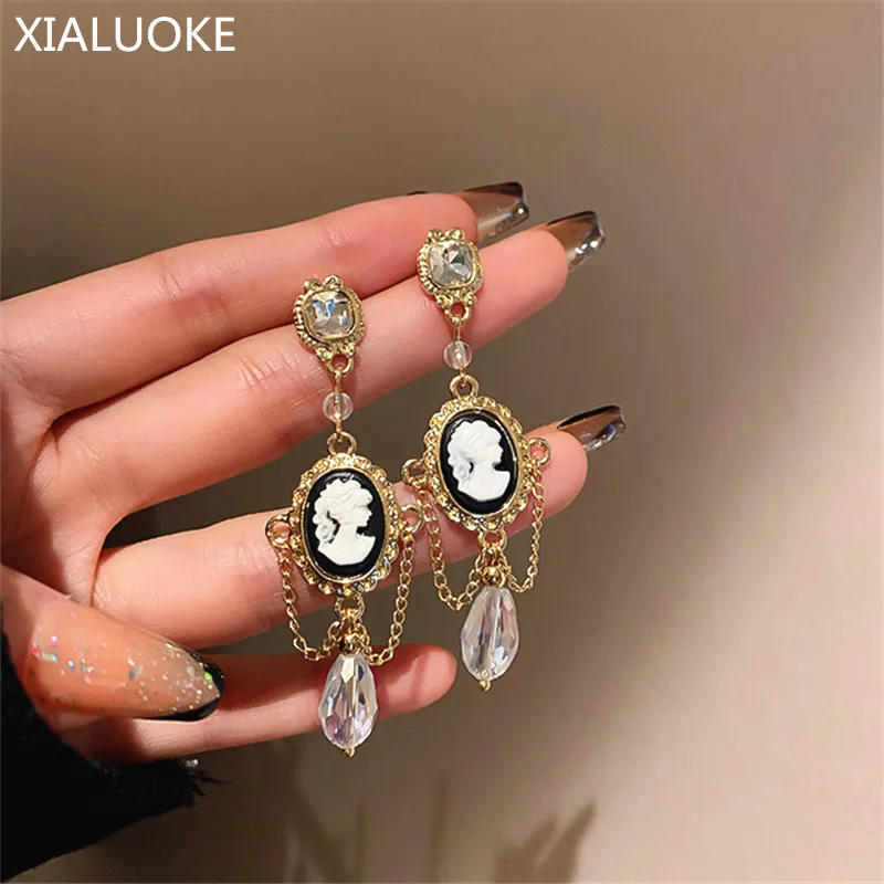

XIALUOKE Bohemian Long Tassels Crystal Pendant Earrings For Women Personality Head Portrait Drop Earrings Party Jewelry Gifts