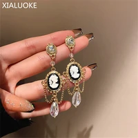 xialuoke bohemian long tassels crystal pendant earrings for women personality head portrait drop earrings party jewelry gifts