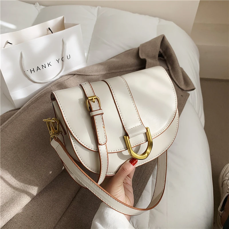 

Spring Semicircle Saddle Small Crossbody Bags For Women Metallic Buckle Half Round PU Leather Baguette Female Shoulder Bags 2021