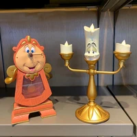 original beauty and the beast candleholder lumiere candlestick cogsworth clock
