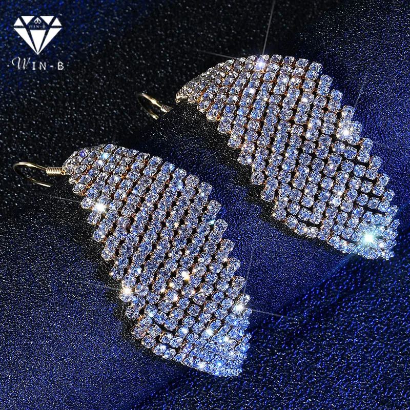 Женские серьги-подвески с кристаллами золотистого цвета цепочкой