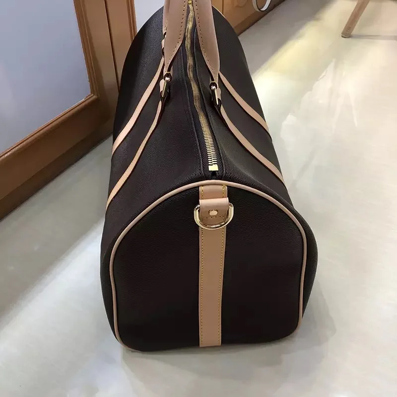 

Brand luxury Designer fashion travelling bag women duffel big size keepall bag genuine leather with high quality free shipping