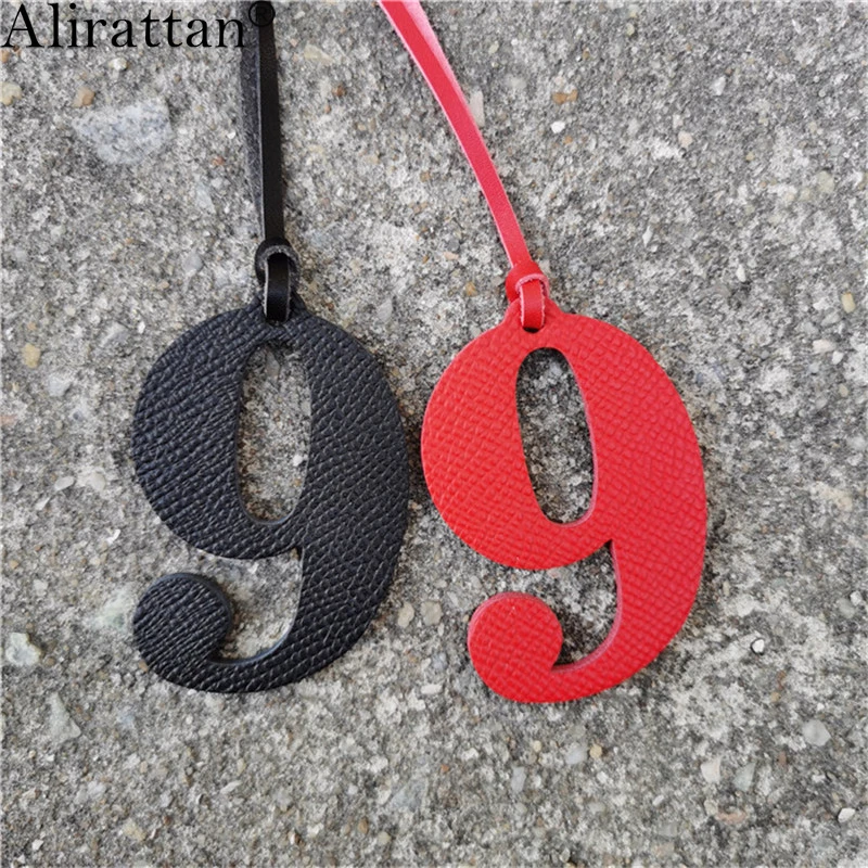 

Alirattan новые цифры из натуральной кожи 9 символов очаровательные DIY Подвески Модные индивидуальные женские кожаные украшения для сумки