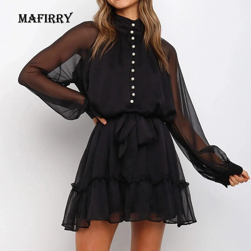 

Платье на пуговицах с воротником-стойкой, длинным рукавом и каскадными оборками