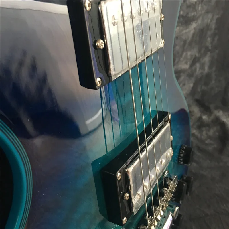 

Custom Electric Guitar Maple Leaf Flame, Big Blue Flower, Silver Accessories, Directly From The Factory
