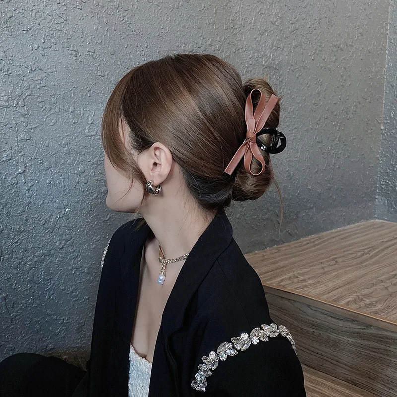 

Brown leather texture bow tie headdress hairpin female Korean net red new temperament back head pan hair big catch clip