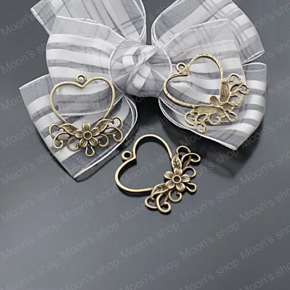 

Wholesale Antique Bronze 31*27mm Heart Earrings hanging head Alloy Charms Pendants DIY Jewelry Findings 20 pieces(JM2386)