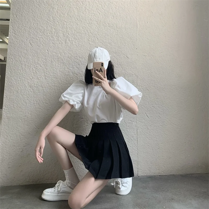 

Lace-up Loose Puff Sleeves Top Versatile Pleated Short Skirt Two-Piece Set