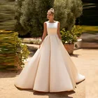 Скромные Простые трапециевидные атласные безрукавные Свадебные платья для невесты с вырезом лодочкой Иллюзия сзади Свадебные платья с аппликацией