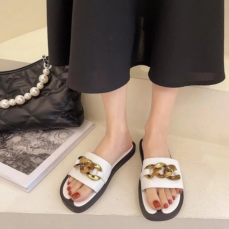 

Flat Muller half-slip shoes in summer wear new fashion wild European and American metal buckle round lazy shoes sandals