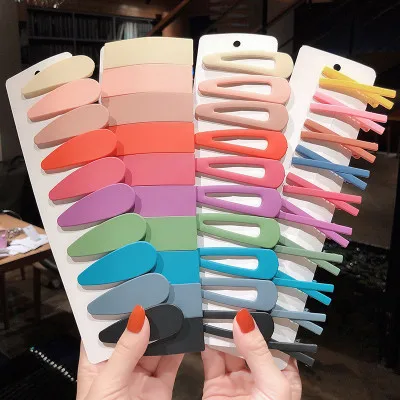 

High Quality Matte Solid Color Rainbow Graffiti X Shape Hairpin Women Triangle Geometric Ponytail Hair Clip Hair Accessories