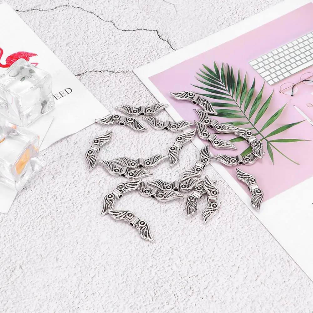 Новинка 20 шт винтажный серебристый оттенок крылья Ангела бусины для