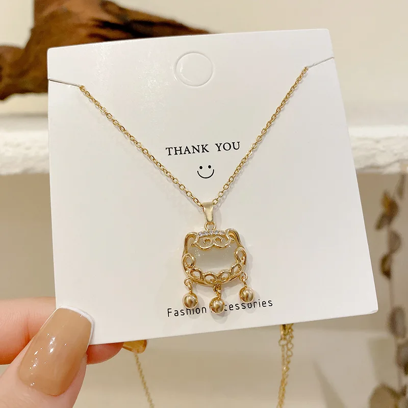 

Explosive Ruyi Peace Lock Opal Pendant Titanium Steel Necklace Female Light Luxury Retro Clavicle Chain