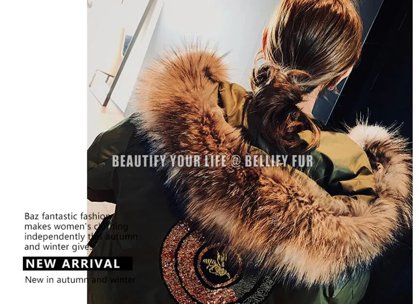 Женское меховое пальто с капюшоном на утином пуху отделкой из натурального меха