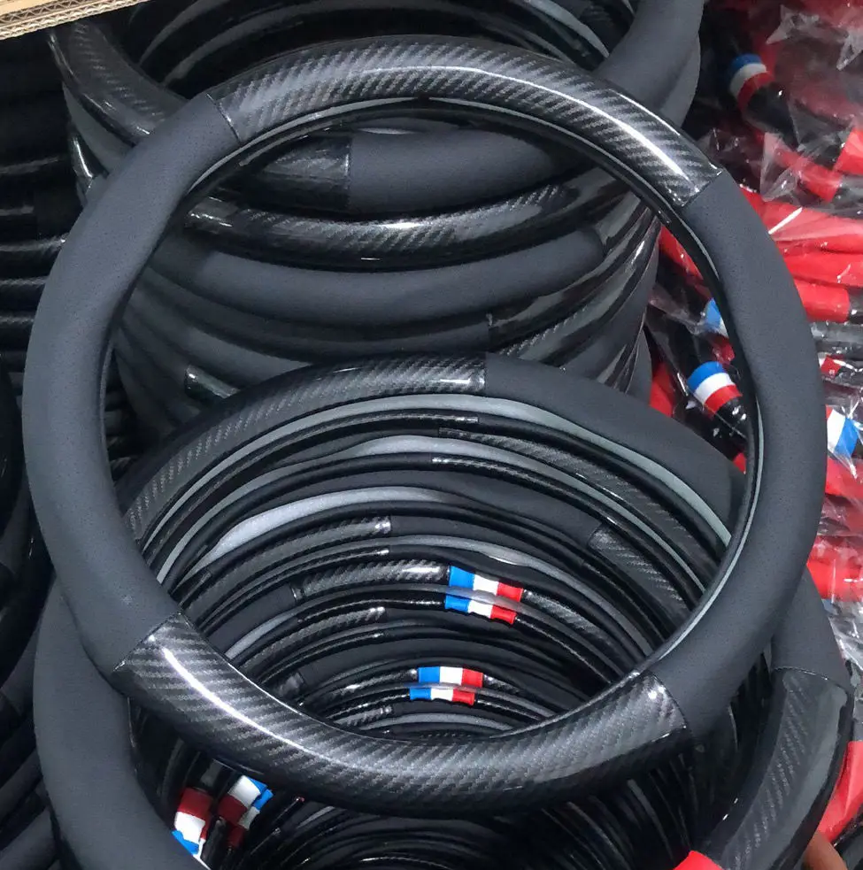 

Hot sell design sport style carbon fiber steering wheel cover with thumb rest