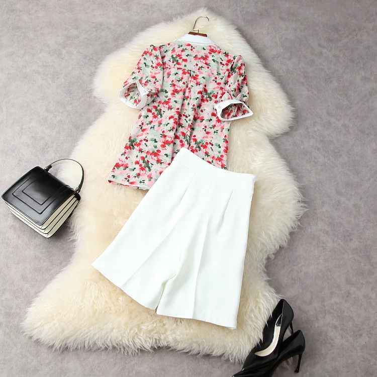 European and American women's wear for summer 2021  Short sleeved printed shirt  Chained high-waisted shorts  Fashion suits