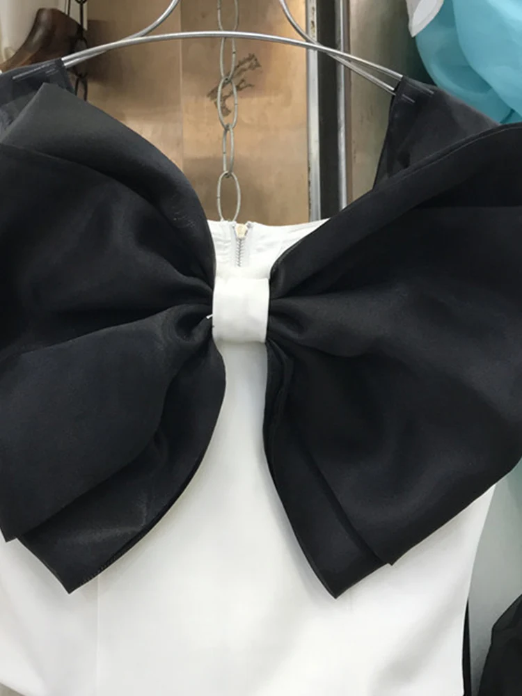 

New summer design, color contrast, bowknot stitching, slim fit, exposed collarbone, vest, sleeveless chiffon shirt, top women