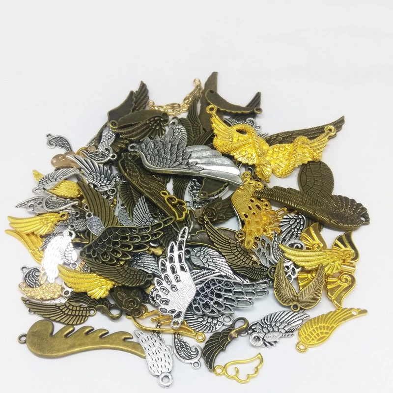 100 граммов в упаковке смешанпосылка из сплава виде крыльев и перьев для легких