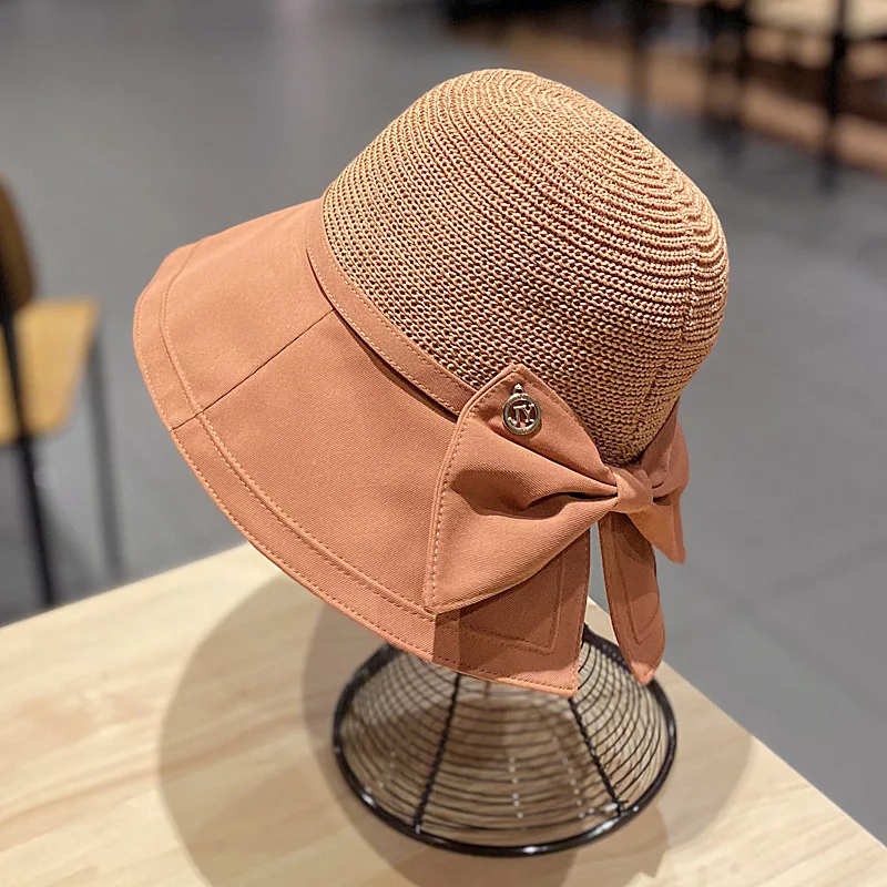 

New hollow sunscreen fisherman hat female spring and summer straw hat bowknot basin hat outdoor leisure beach hat pink hat