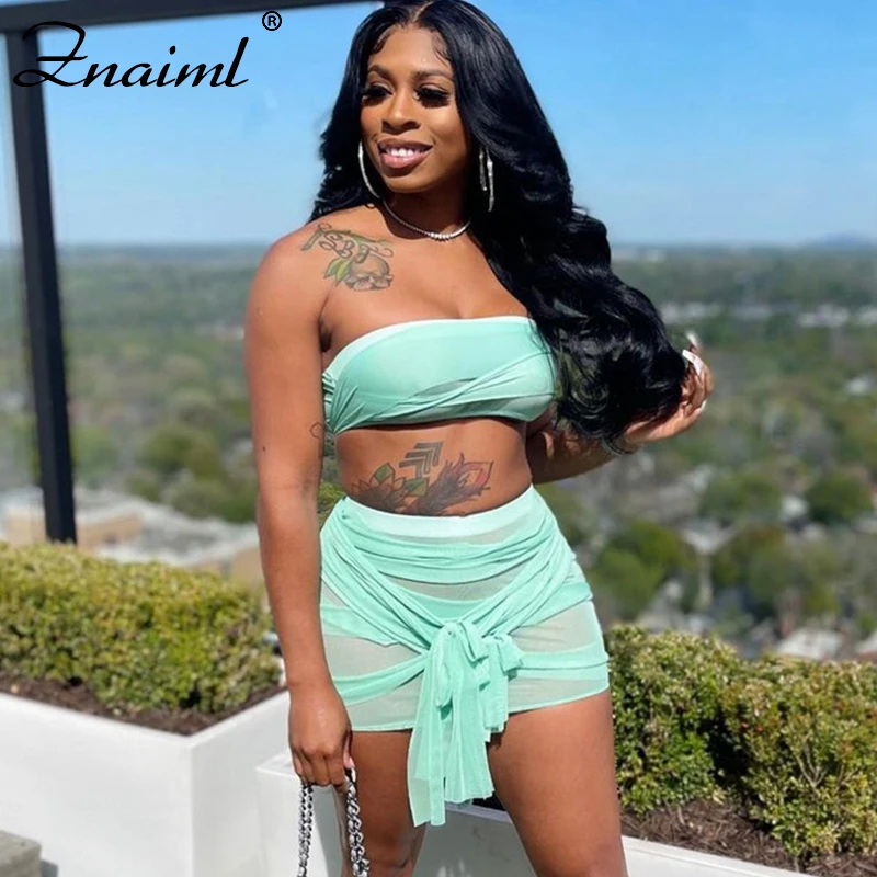 

Znaiml Summer See Through Mesh Beach Cover-Ups Set Women Strapless Crop Tops And Bandage Mini Skirt Two Piece Set Sexy Club Wear
