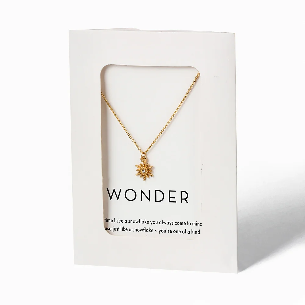 Женская цепочка с подвеской в виде снежинок золотистого и серебряного цвета