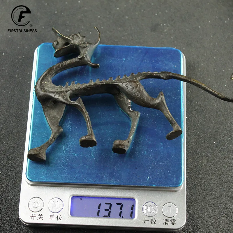 

Статуэтка дракона из меди