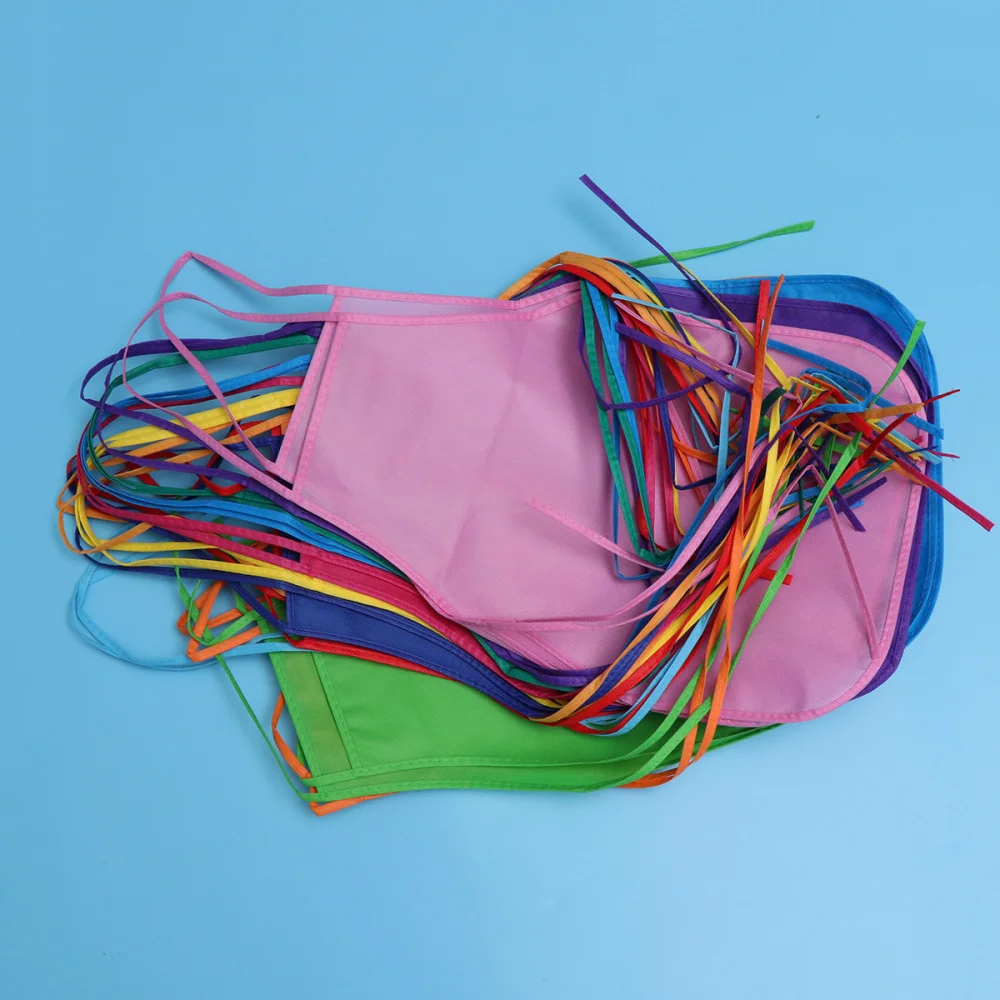 

12pcs Children's Artists Aprons Non-woven Fabric Disposable Painting Aprons for Class Crafts Art Painting ActivitiesRandom Colo