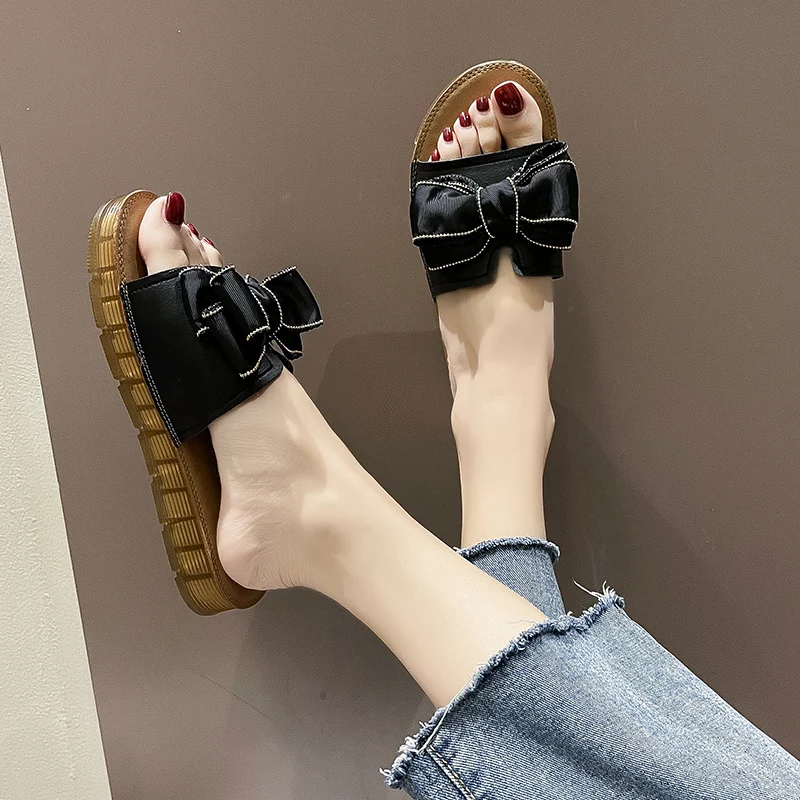 

2021 new fashion popular ladies solid color thick bottom outside wear bow casual slippers 2004