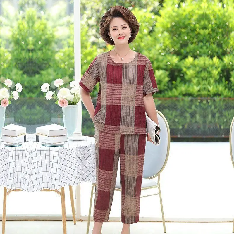 

Женский комплект из двух предметов, летний пуловер с круглым вырезом, свободные топы с коротким рукавом и принтом, большие размеры, клетчаты...