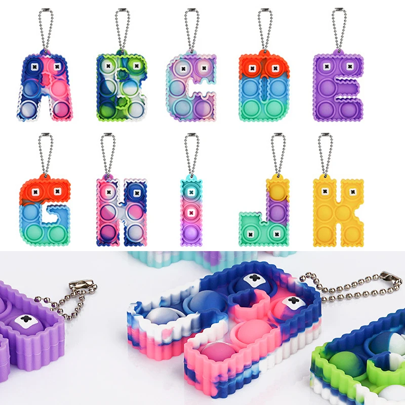 

26-letter Cartoon Anime Popping Decompression Keychain Push Bubble Silicone ITS Bag Ornaments Children Halloween Birthday Gifts