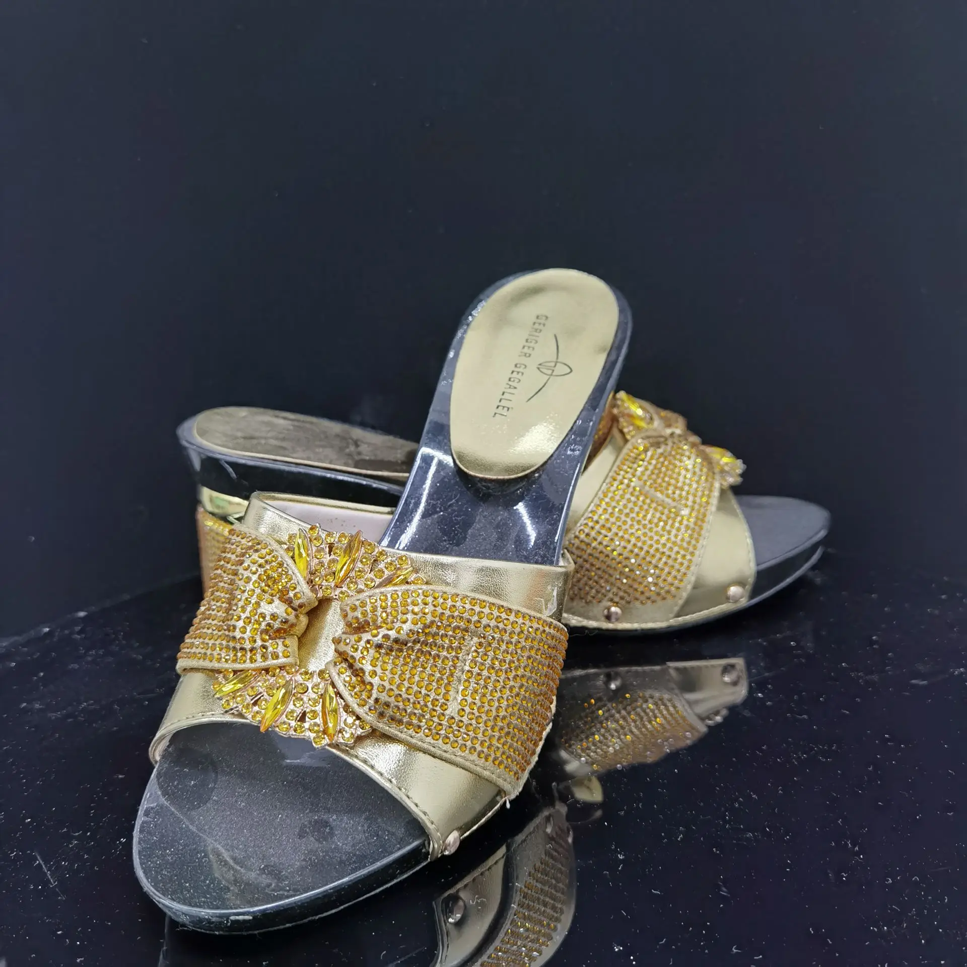 

Ladies' golden fashion slippers at sale price